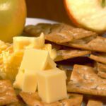 Crunchy Harmony: Cheddar & Apple Slices on Crackers
